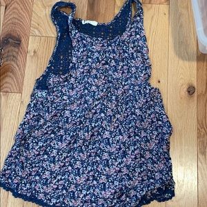 Blue floral romper with crochet back